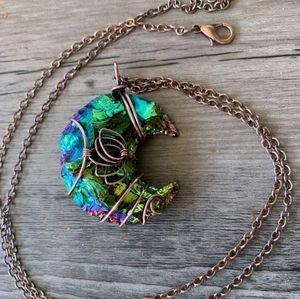 Titanium crescent moon